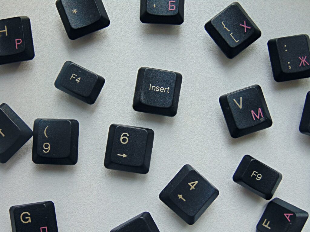 a close up of a keyboard with many letters